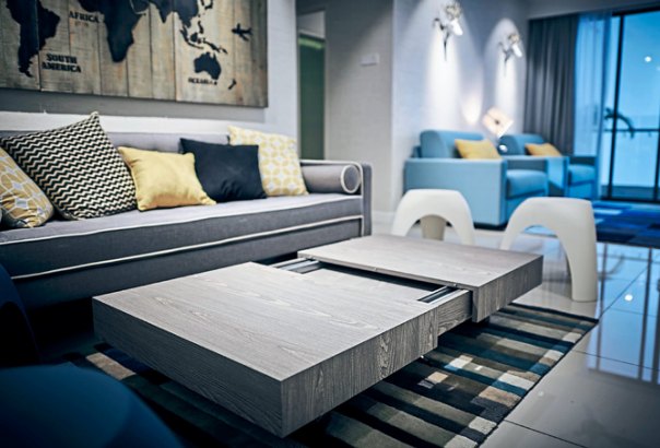 The expandable coffee table by MOCOF is one example of space saving furniture incorporated into the interior design in units offered at the Paramount Utropolis service apartment.