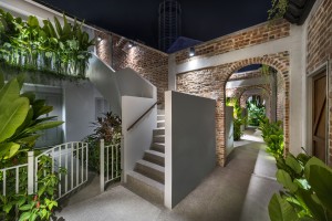 The lush and airy courtyard entry.