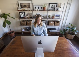 Kelsey Cary poses for a portrait in her home on Feb. 2, 2016 in Eastborough, Kan. Cary's bathroom, hallway and the exterior of her home has been inspired by Pinterest. (Mike Hutmacher/The Wichita Eagle/TNS)