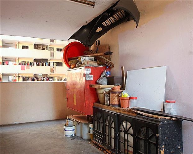 Thursday, 9 June 2016 Flat owners refuse to pay for maintenance BY BAVANI M Popular Now in Metro Fine-tuning entrepreneurs’ skills DBKL to go full force with raids on PPR units after Hari Raya String of dumplings in Jalan Alor sets new record A book dedicated to the Penans Too close for comfort THEY were squatting in Kampung Haji Abdullah Hukum for decades until they were relocated into a new housing scheme called Putra Ria in Jalan Bangsar about 20 years ago. The three-bedroom-two-bathroom units, measuring 600 sq ft, were later sold to them for RM32,000 per unit, while corner lots went for RM35,000. Today the asking rate for each units is between RM220,000 and RM250,000 each. And the rent can go as high up as RM1,700. Understandably so, since Putra Ria is one of the last few low-cost developments left in the posh neighbourhood of Bangsar. 1 Old rotting motorcycles are an eyesore in Putra Ria’s premises.2 Various items are left in the common area.3 Leaking pipes are resulting in mould to grow on the walls of the building. Old rotting motorcycles arean eyesore in Putra Ria's premises. Today, more than 50% of the residents are foreigners working in and around the township. Unit owners are able to rake in high rental rates due to the strategic location of the apartment. Some owners have no qualms renting out their units to more than 10 people because they claim the foreign tenants are better paymasters. Taxpayers footing the bill But guess who is paying for their maintenance fees? Despite buying over the units from Kuala Lumpur City Hall (DBKL) almost two decades ago, the owners of the units refuse to pay maintenance fees. “We have tried numerous times employing all sorts of methods to get them to take responsibility and ownership of their home, which includes the flats’ grounds and common areas, but they have this attitude that they are entitled to free service,” said DBKL Housing Management and Community Development director Wan Mohammad Ghazali. “The properties are now private and as the legal owners, these residents should have formed their own management corporations (MCs) and joint management bodies (JMBs) by now to manage the accounts and have a proper collection system. 1 Old rotting motorcycles are an eyesore in Putra Ria’s premises.2 Various items are left in the common area.3 Leaking pipes are resulting in mould to grow on the walls of the building. Various items are left in the common area.