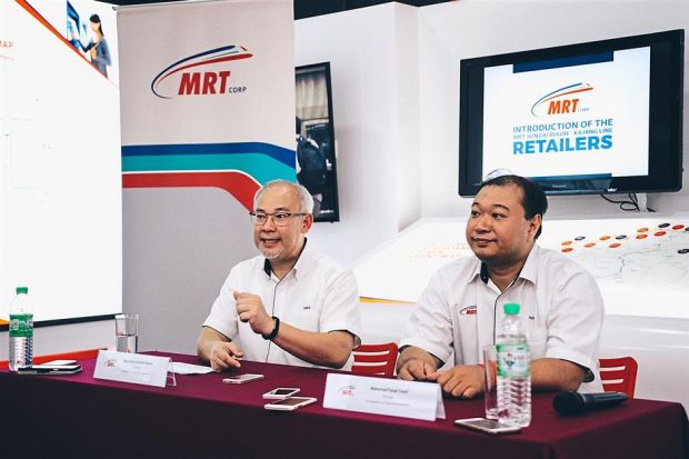 Haris (left) and Commercial and Land Management (Retail and MSPR Unit) manager Mohd Faizal Yusof addressing the media after introducing the retailers.