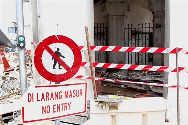 After a dome spire from the 108-year-old building collapsed late last year, questions have been raised on the condition of similar buildings in the area. — Photos: MOHD FAIHAN/The Star