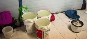 At some quarters, workers have to prepare their meals on the floor where they also place pails and other bathroom wares.