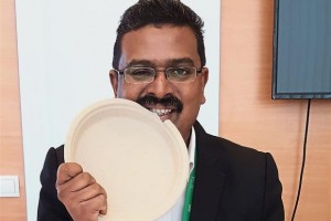 Edible plate: Ramaness taking a bite out of his product to show that it is safe and can even be eaten.