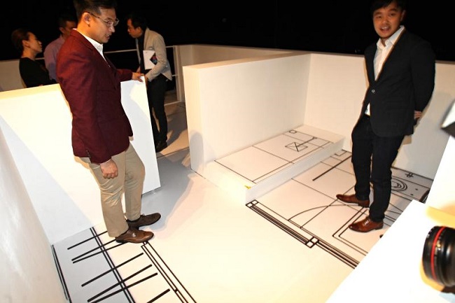 One of the configuration options showcased at "The Bloc Party" with Goh looking on.