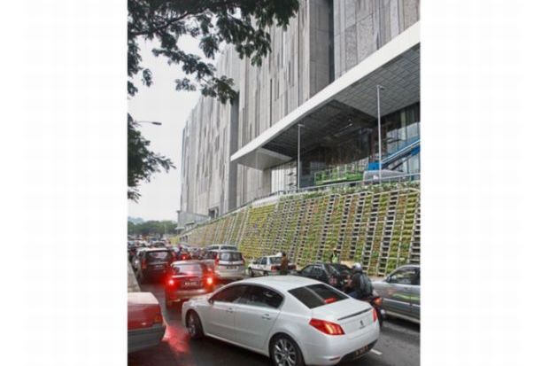 Traffic congestion on Lorong Sarawak next to the upcoming mall during a ‘pasar malam’ in Taman Melawati. Residents expect the situation to worsen once the mall opens.