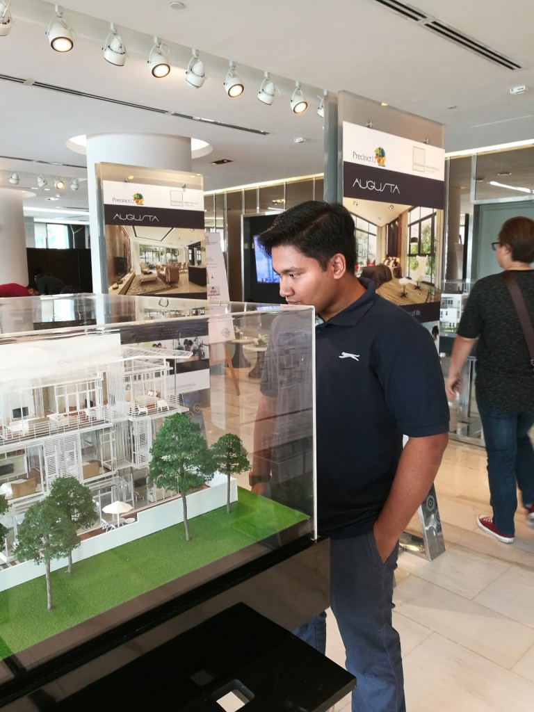 Syamim Harun looking at the display unit