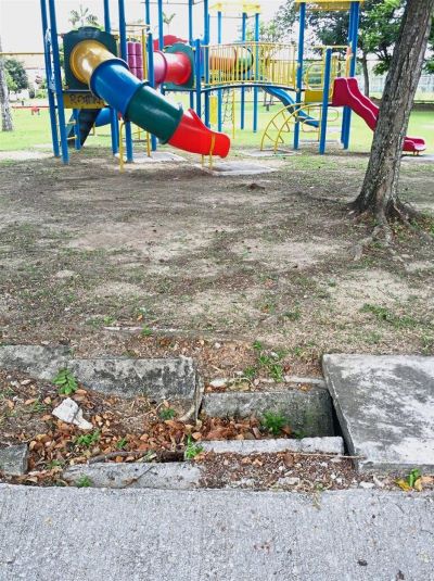 Damaged drain covers at the playground in Jalan Anggerik Doritis 31/161 pose a danger to children.