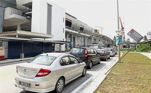 Vehicles are even parked near the pick up/drop off and bus stop area outside the Ara Damansara LRT station.