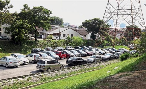 The original parking facility located behind the Taman Bahagia LRT station is always at maximum capacity while the other two on either side of it remain less than a quarter full.