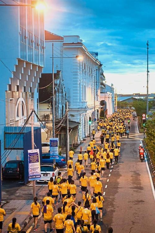 The participants running along one of the roads in the heritage enclave in George Town.