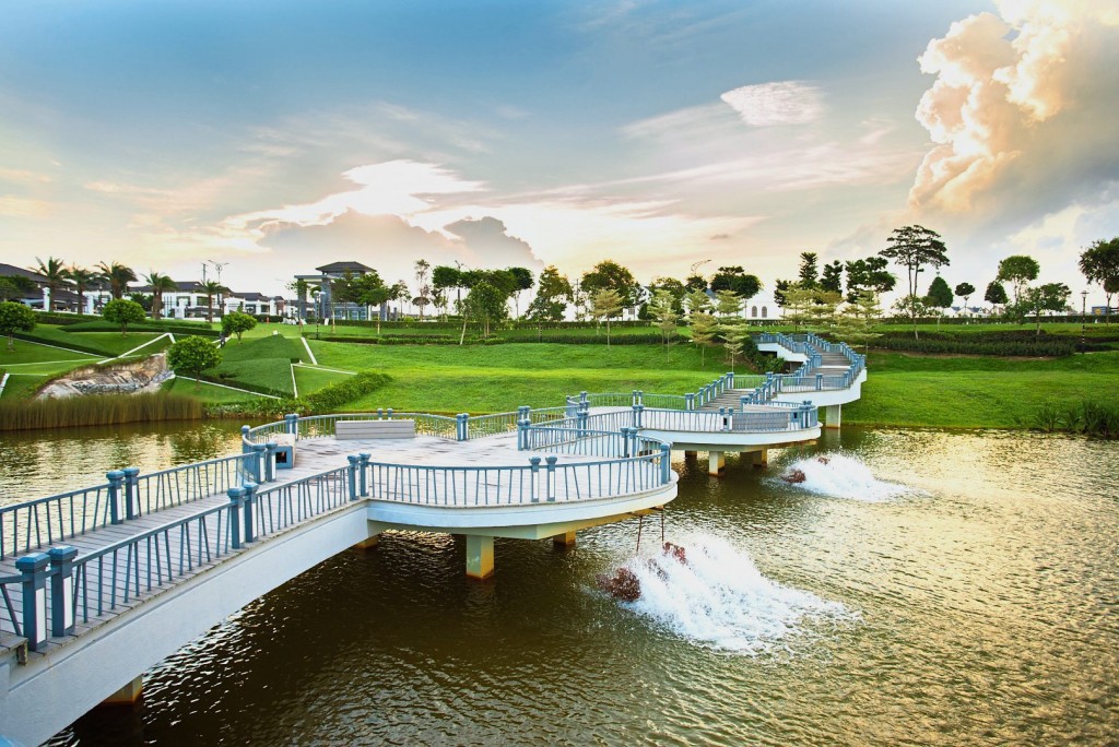 Pristine garden and glistening lake make the outdoors interesting and attractive.