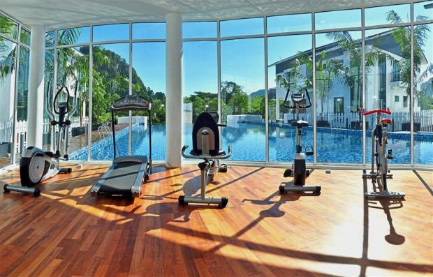 The fully equipped gym and the swimming pool at the Green Planet Living Tambun Road.