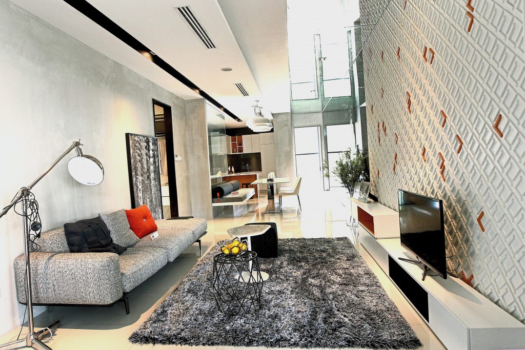 The spacious living room is designed to provide space for families to spend time together.