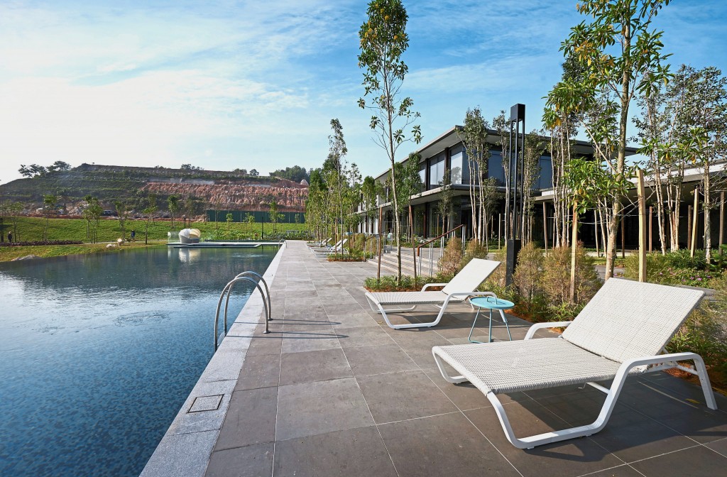 Residents can relax at the Clubhouse while overlooking the olympic length infinity swimming pool.