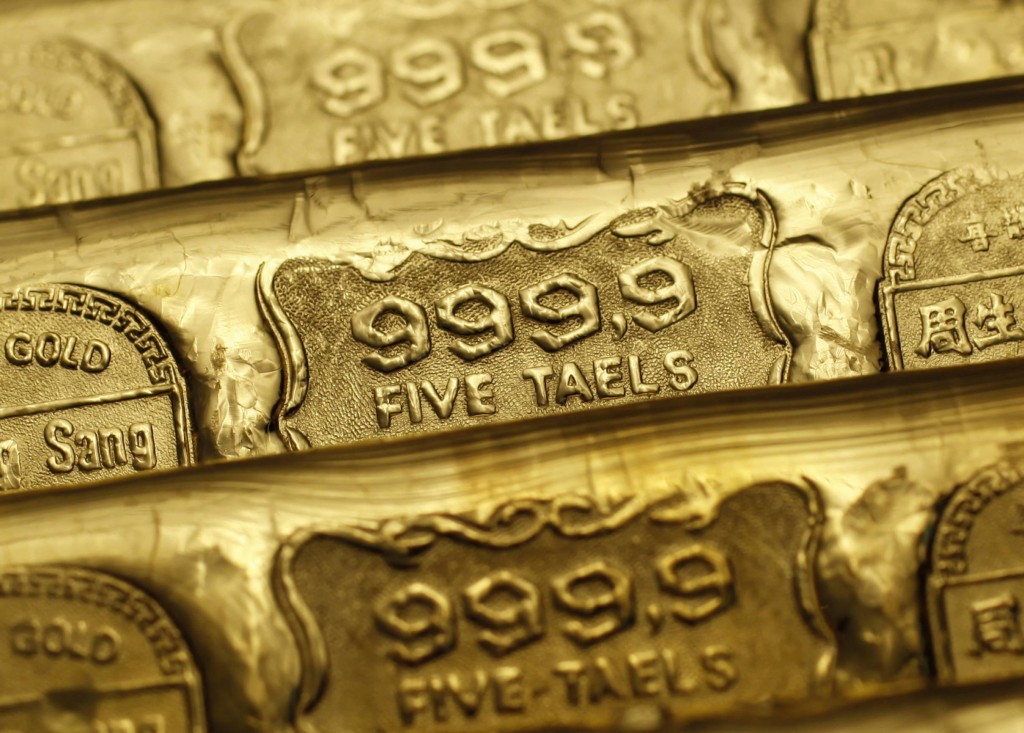 Photo illustration shows gold bars at a jewellery store in Hong Kong