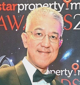 Winning Honours for The Best Touch & Feel Award Ayer Holdings Bhd group chief executive officer Eugene Khoo and sales and marketing manager Chris Lee posing with the trophy.