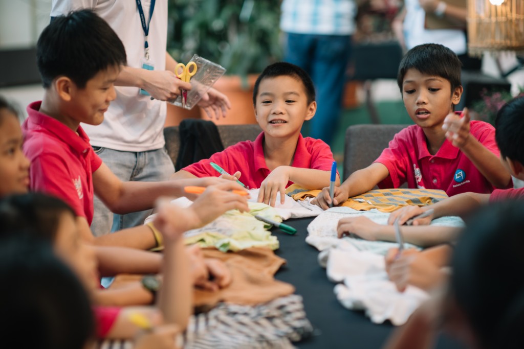 Children from House of Joy enjoying themselves in the DIY Tote Bags workshop conducted by UTAR Sustainability Development Club