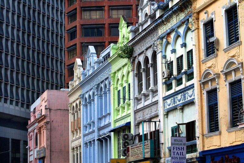 By 1920, stately three-storey shophouse and banks replaced the gambling sheds previously occupying the area.