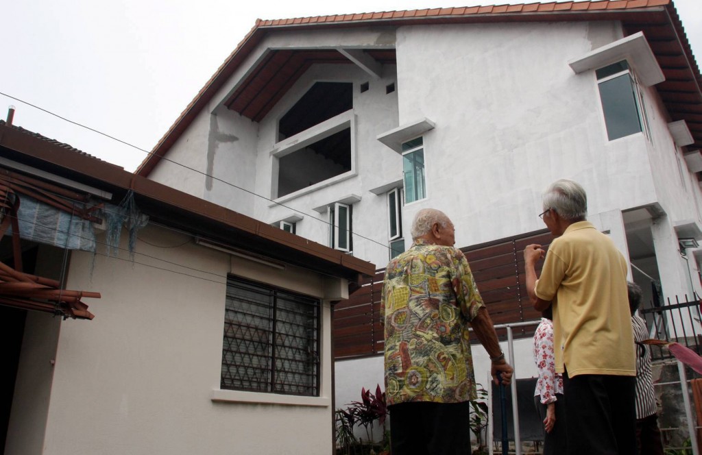 Neighbours are puzzled as to whether this home in their neighbourhood has the proper approvals to carry out this renovation.