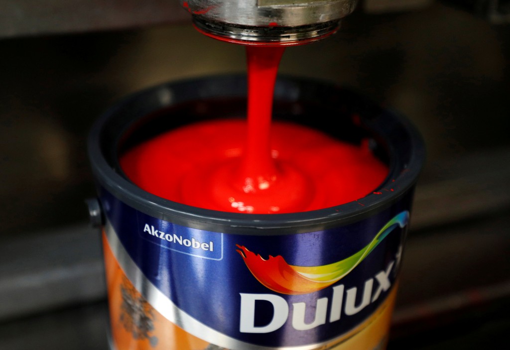 FILE PHOTO - Dulux paint cans are filled on the production line inside AkzoNobel's new paint factory in Ashington, Britain September 12, 2017. REUTERS/Phil Noble/File Photo GLOBAL BUSINESS WEEK AHEAD