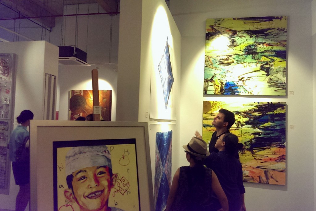 Visitors admiring artworks at the launch of Artseni at Gateway Kiaramas in Mon’t Kiara, Kuala Lumpur.