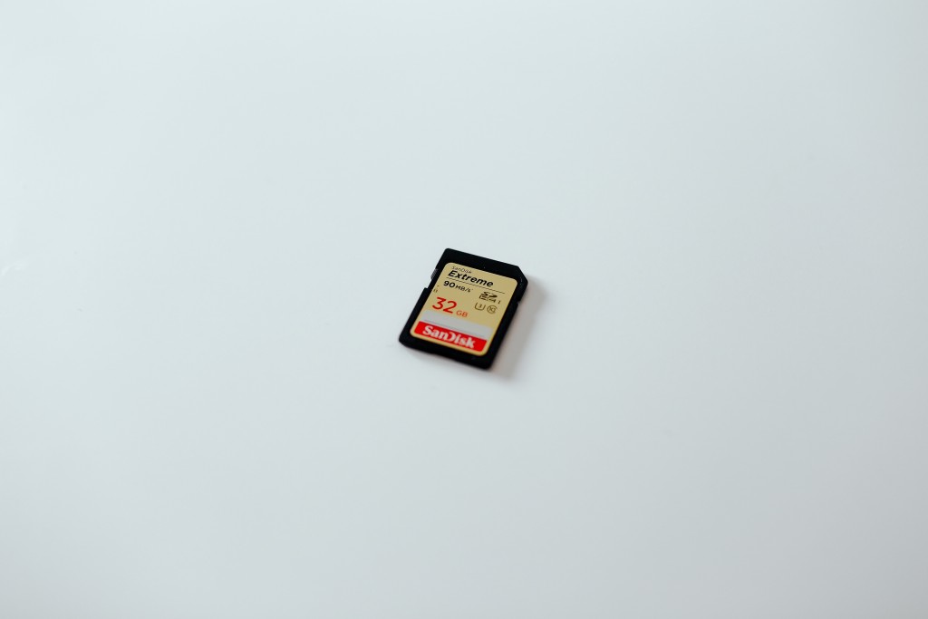 The SD memory card is a recoverable, low-profile form of storage that allows for transmission to be avoided entirely – if it can be reliably recovered. Photo by Tom Pumford on Unsplash.