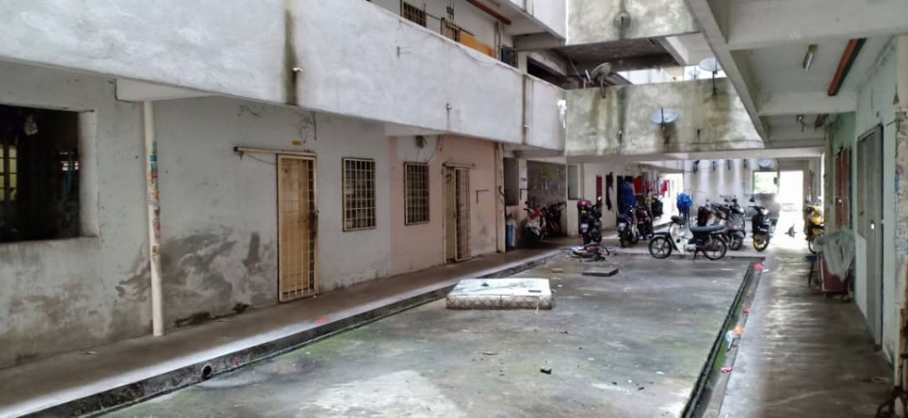 An old mattress thrown out into the corridor of Pangsapuri Angsana shows residents’ lack of care for cleanliness.