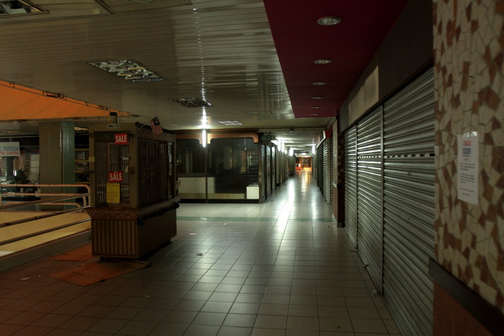 The  quiet and empty Ampang Park shopping centre after tenants moved out and before the complex was demolished.