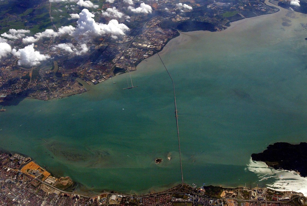 The view of Penang island and Butterworth as seen from a plane. The line connecting both sides is the Penang Bridge.