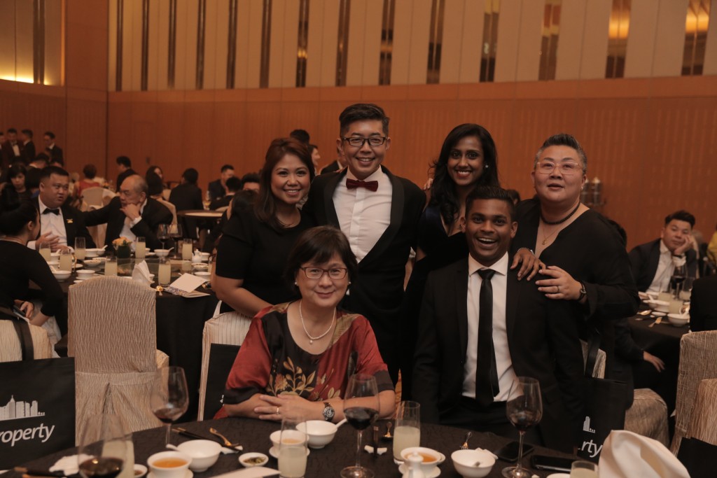 Esprit Estate Agent managing director Aldrin Tan (standing, second from left) posing for a photo with his team at the 2019 StarProperty Real Estate Awards. AZHAR MAHFOF/The Star