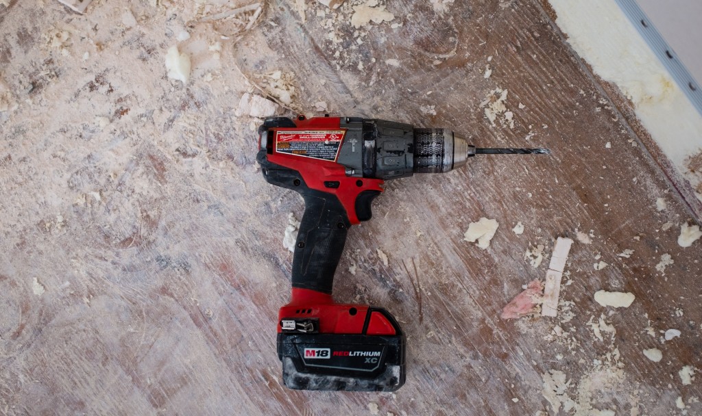 Pro tip: if you’re looking to buy a cordless drill, you should know that the battery pack makes it a little heavier. Photo by NeONBRAND on Unsplash.