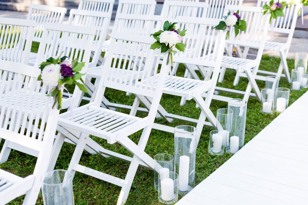 Wooden or decorative chairs add a touch of elegance as opposed to plastic ones.