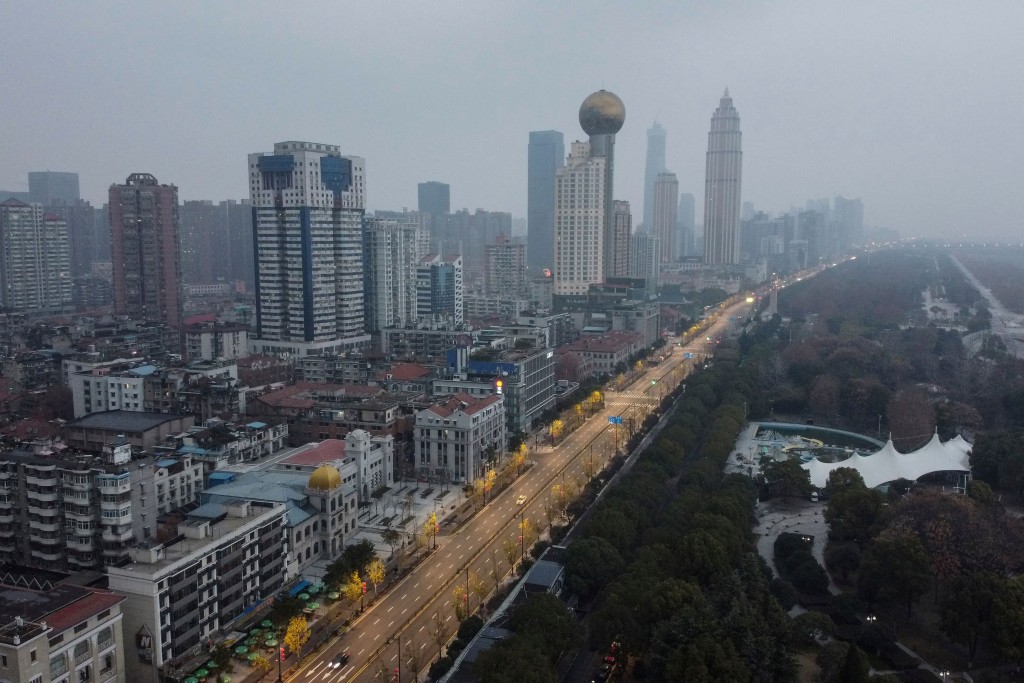 Citizens of Wuhan in China's central Hubei province have been placed under quarantine along with 15 other cities as the outbreak worsened (Photo of Wuhan by Hector RETAMAL / AFP)