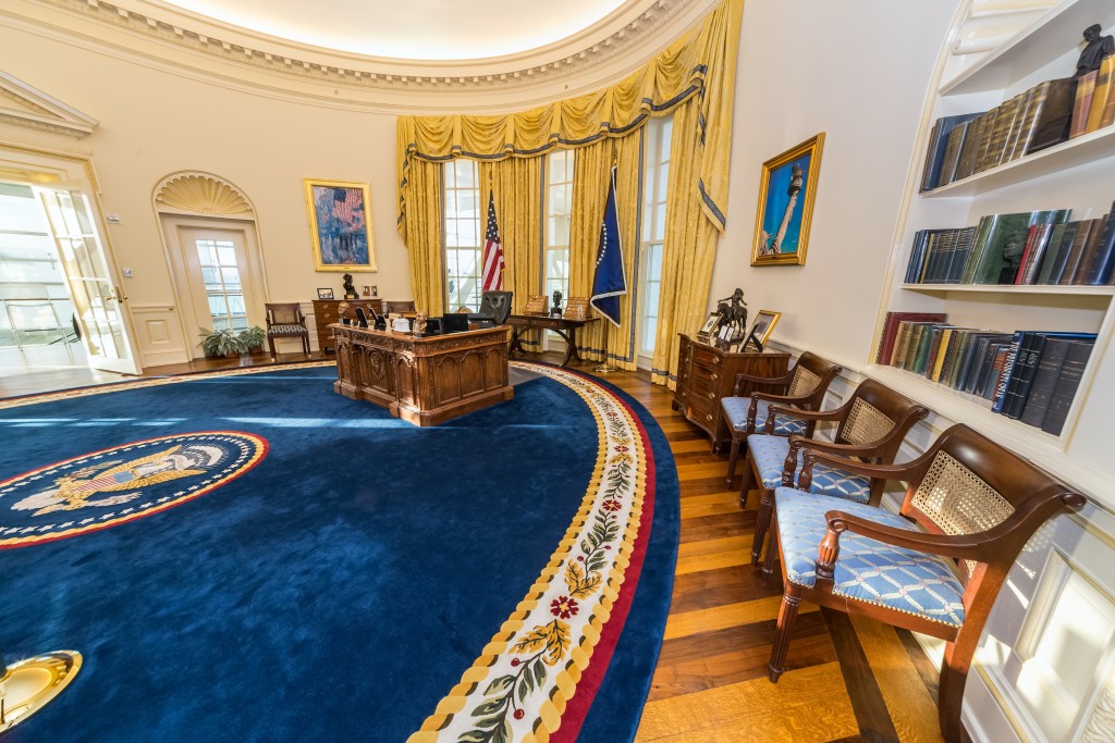 White enamel wainscot tracing back centuries as can be observed on the walls of this replica of White House Oval Office, Washington DC. 