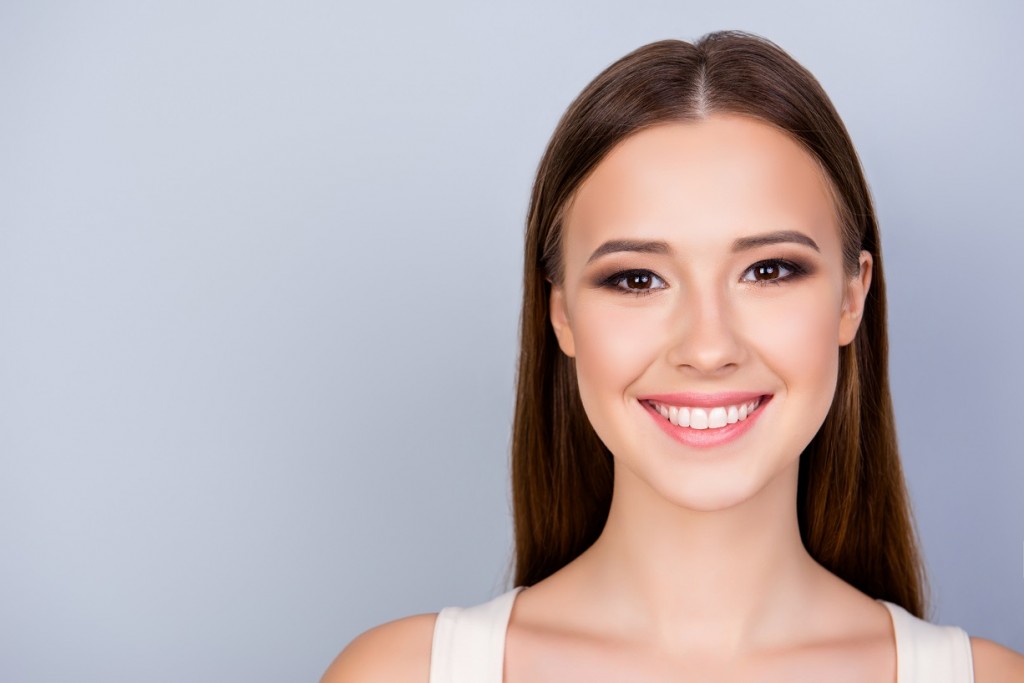 Close up cropped photo of young cute charming lady on the pure l