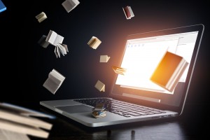 Laptop with books. Mixed media