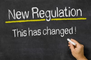 Blackboard with the text New Regulation