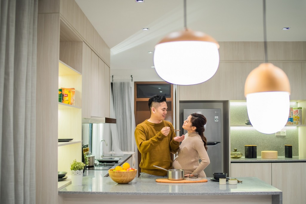 Open concept living embraces the dining and kitchen area to maximise natural ventilation and light penetration.