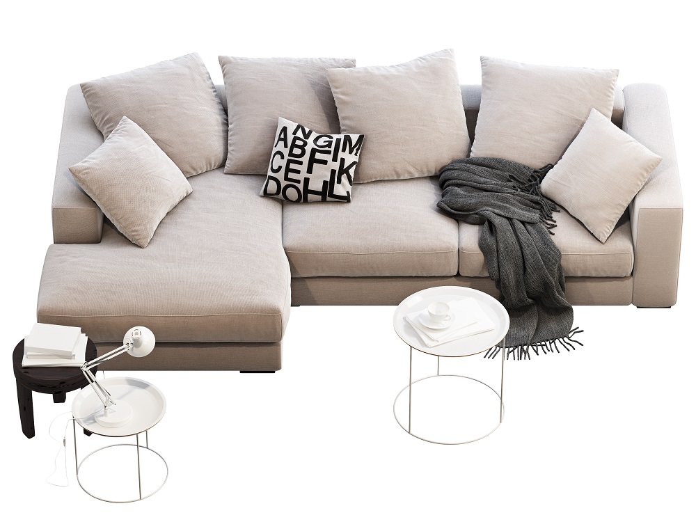 Small middle pillow with graphics unites the white sofa, black throw blankets and the other furniture.