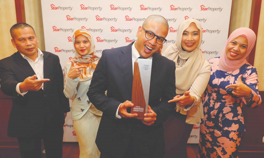 The Worldwide Holdings team celebrates after winning the award. From left are acting property general manager Azmi Ali, assistant sales manager Shiela Tajudin, sales and marketing senior manager Amirul Azhar, project manager Sharifah Farida Anum and assistant marketing manager Yusnita Yaacob. 