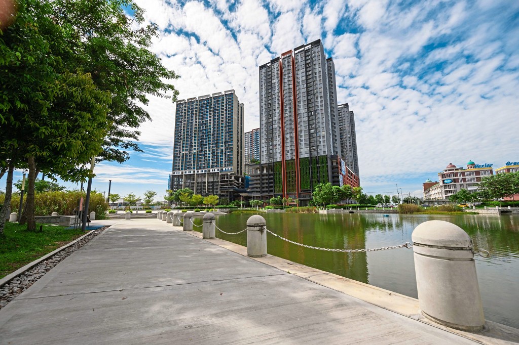 The Pier8 Mall and the  residential towers as seen from  the lakeside.