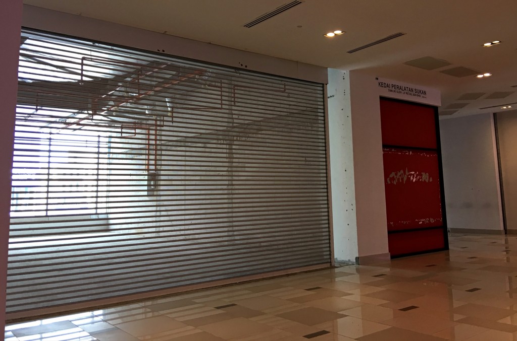 An increasing number of lots at shopping malls are vacated. -  NORAFIFI EHSAN/The Star.