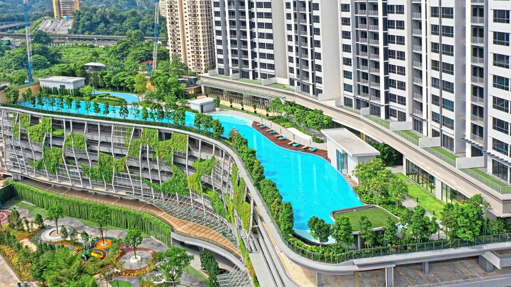 The 100m Horizon Pool surrounded by trees and shrubs