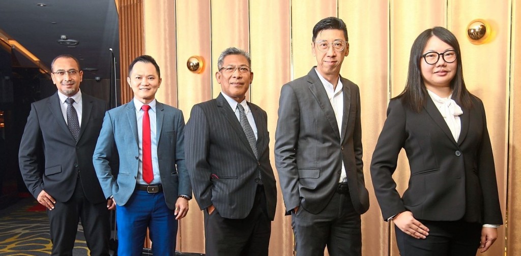 (From left) Ezumi, Liew, Irhamy, Kong and Ngo standing side by side.