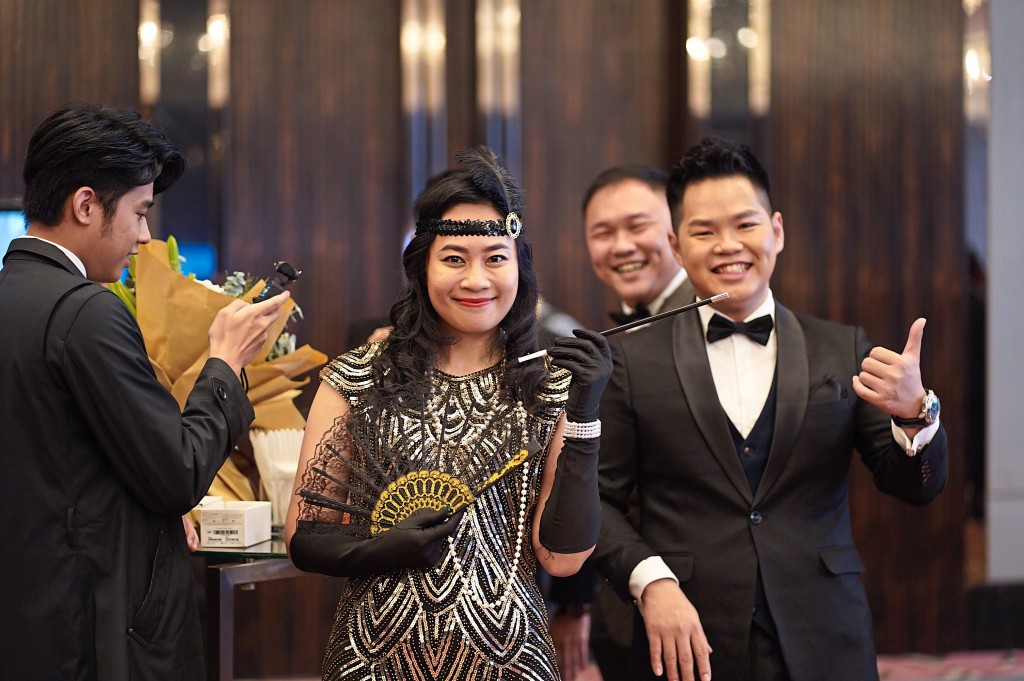 Rachel Chu (left) and Andy Teoh from Gather Properties make their way to their table.