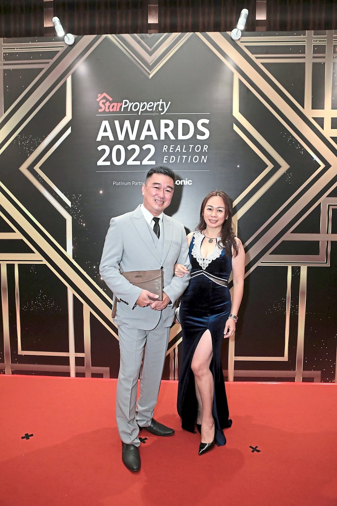 Wincent Liang (left) and Yen Tan from IQI Realty are all smiles.