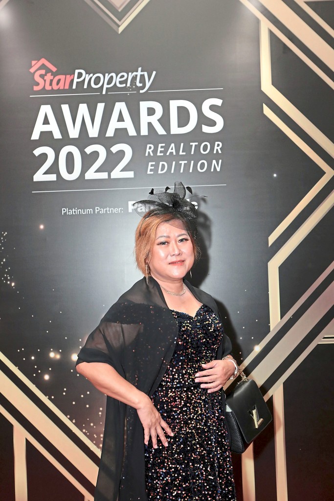 WEREG Properties’ Mallie Kuan is all glittered up for the night.