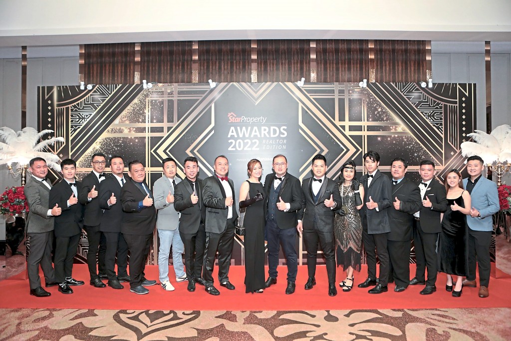 Gather Properties members are all eager for the dinner to start.