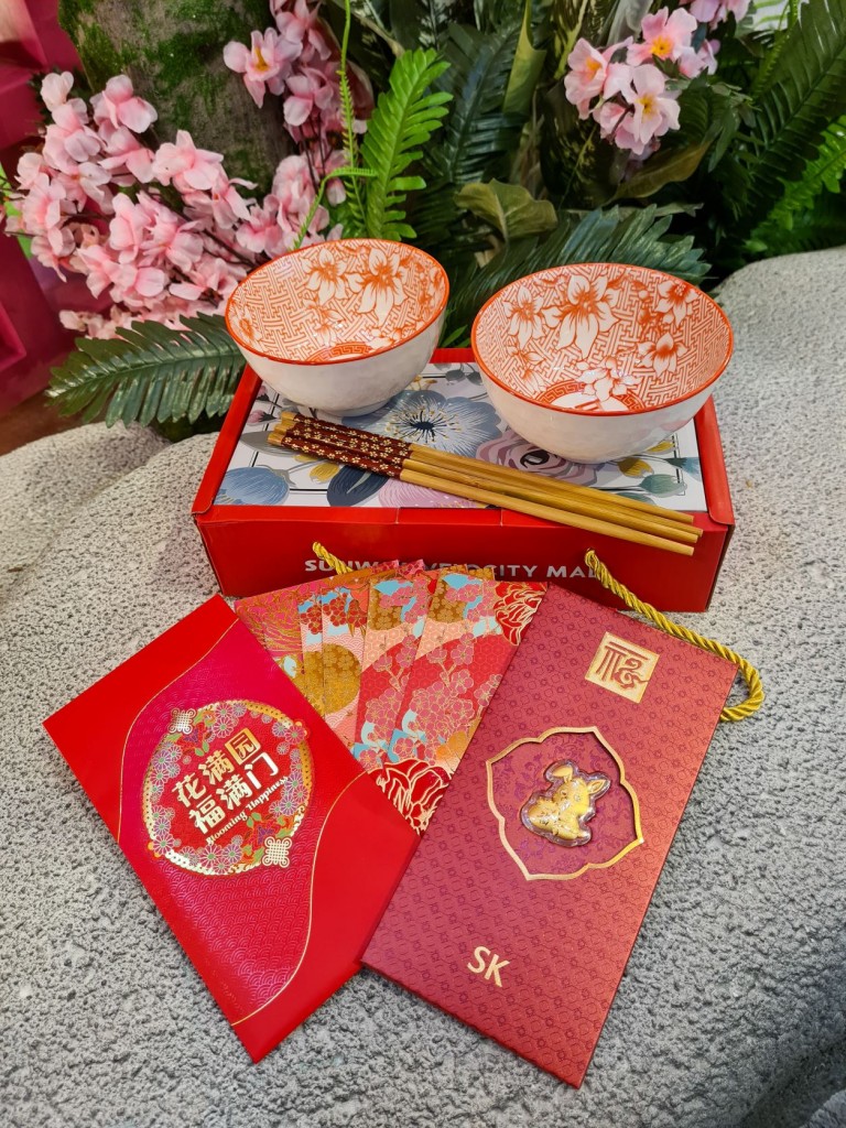 The exclusive Blooming Redemptions include the Fortune Blooms Angpows, Fu-Blossom Bowl Set and 999 Pure Gold Bunny Coin Angpows.